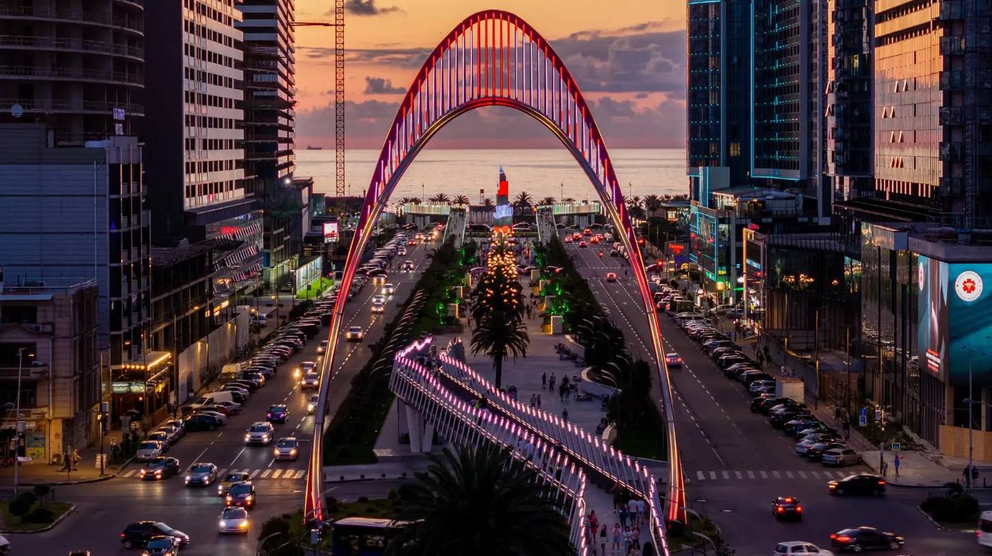 Pedestrian bridge and Black Sea Arch on Alley of Heroes, Batumi